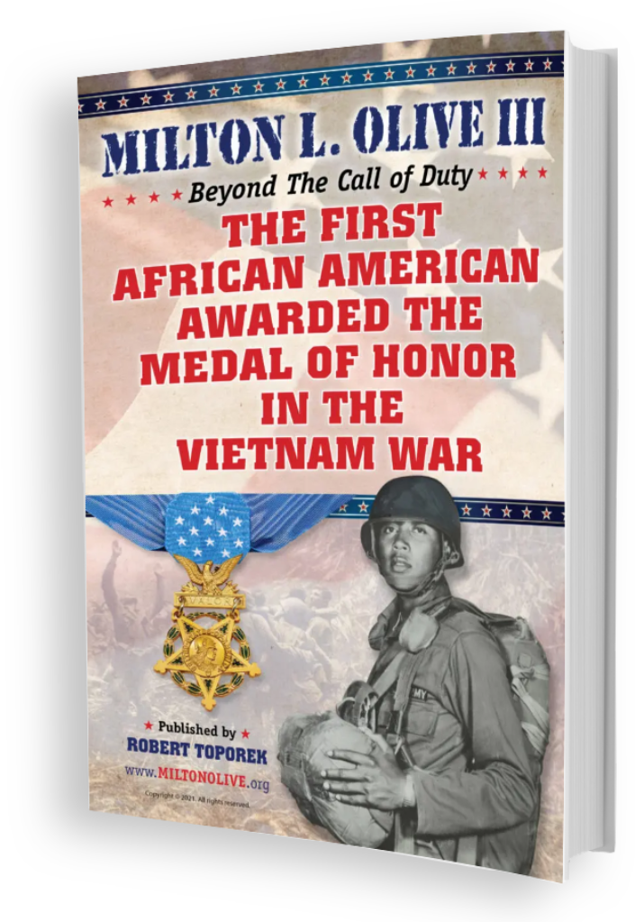 A book cover with an image of a man and a medal.